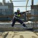 Construction workers reviewing contracts on-site
