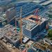 Construction site with ongoing work and a focus on management tools.