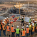 Construction project team assessing risks using digital tools